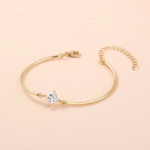 Detail of gold-plated bracelet featuring a square zircon and adjustable lobster clasp
