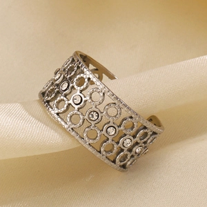 Retro geometric hollow stainless steel ring with white rhinestones and open design
