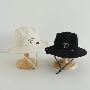 Outdoor children's wide-brim bucket hats in beige and black with cartoon embroidery