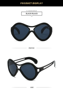 Detailed front and side view of black oversized butterfly sunglasses with hollow temples