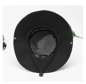 Detail of breathable mesh lining and adjustable windproof cord on a black sun hat