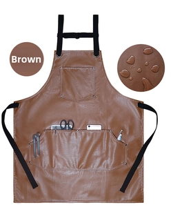 Dettaglio del grembiule marrone in pelle PU impermeabile con tasche e resistenza all'acqua