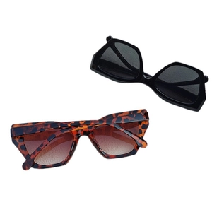 Retro small cat eye sunglasses for women in black and tortoiseshell acetate frames