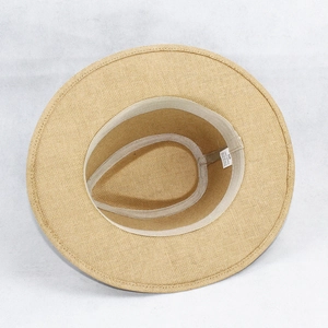 Detail view of the 58cm sweatband and 100% paper straw texture inside the summer sun hat