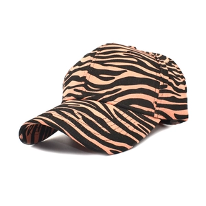 Classic cotton baseball cap with orange zebra print and curved brim for outdoor style