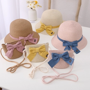 Kids straw hat and matching purse set with large decorative bows for summer beach wear