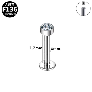Detailed macro view of 1.2x8mm G23 titanium labret stud with internal threading