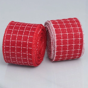 Detail of red and white checkered burlap ribbon with natural frayed edges for Christmas decor