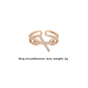 Detail view of adjustable gold-plated X-ring with zircon inlay showing 6cm size and 2g weight