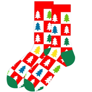 Detail of knit Christmas crew socks with festive red and white plaid and tree patterns
