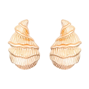 Golden spiral conch shell stud earrings with textured metallic finish on white background