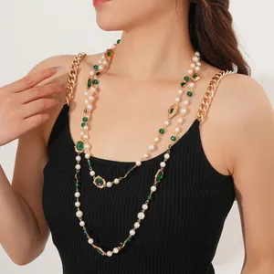 Vintage multi-layer pearl necklace with emerald green gemstones and gold finish