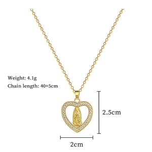 Detail of gold heart pendant with Virgin Mary relief and dimension specifications