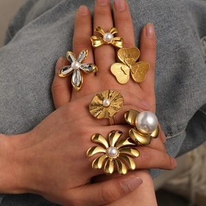 Gold petal and bow knot titanium steel ring set with pearl accents for women