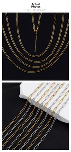 Detailed close-up of gold and silver stainless steel paperclip chains with lobster clasps