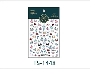 Vue détaillée des autocollants nail art gaufrés thème Hawaii avec motifs bikini et nœud