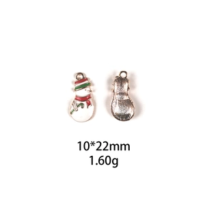 Detailed view of 10x22mm enamel snowman charm for DIY jewelry with dimensions and weight