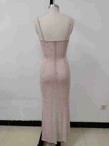 Detail of pink sequin long dress featuring thin straps and back hidden zipper closure