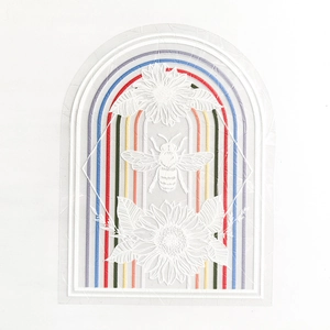 Detail of arch suncatcher window sticker with embossed bee sunflower and rainbow border