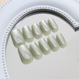 Minimalist mint green cat-eye press-on nails in short square shape for women