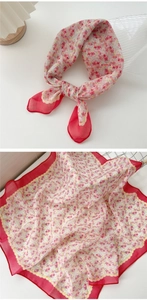 Macro detail of breathable floral linen-cotton square scarf with red decorative piping