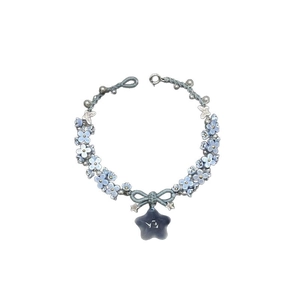 Blue woven bracelet with delicate 3D flowers, silver star charms and butterfly pendants