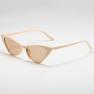 Detailed side view of vintage cat eye sunglasses in milky beige with brown lenses