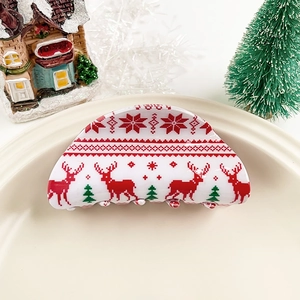 Pince à cheveux de Noël avec motifs de renne et flocon sur fond blanc festif