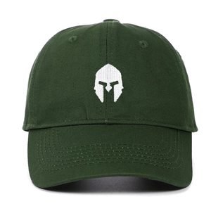 Close-up of white spartan helmet embroidery on dark green cotton baseball cap