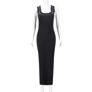 Detail of square neckline with gradient rhinestone accents on a black knit bodycon dress