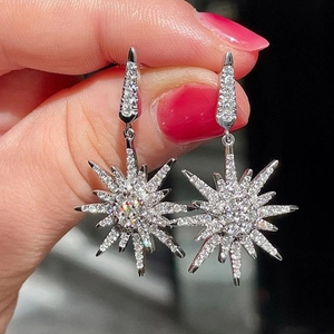 Boucles d'oreilles de luxe tournesol étincelant avec design étoile d'argent et cristaux CZ