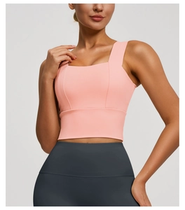 Detailed view of pink square neck sports bra with wide straps for high-impact support