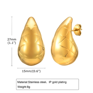 Detail of gold water drop earrings in stainless steel with quilted texture and dimensions