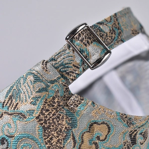 Macro detail of Chinese style jacquard baseball cap featuring silver metal buckle and strap