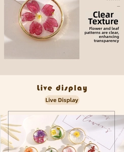 Macro detail of round alloy pendants with real dried flowers and gold metal frame