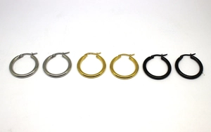 Three pairs of 3mm thick stainless steel hoop earrings in silver, gold, and black finishes