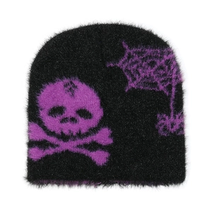 Detail of soft fuzzy knit beanie featuring purple skull and spider web graphic patterns