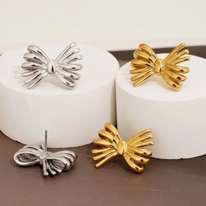 Boucles d'oreilles nœud papillon en acier inoxydable, finitions dorées et argentées