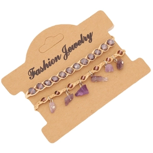 Bohemian braided purple amethyst bead bracelets set on a fashion jewelry display card