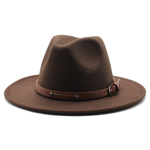 Detail of dark brown fedora hat with a leather band, metal buckle and silver studs