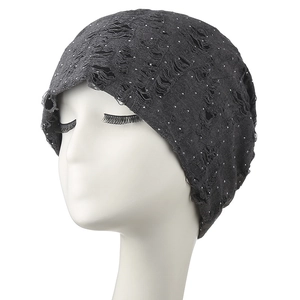 Distressed dark grey knitted beanie with silver rhinestone accents for women