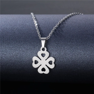 Elegant silver four-leaf clover necklace with heart-shaped petals in stainless steel