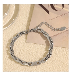 Polished silver stainless steel Cuban link bracelet with lobster clasp and extension chain