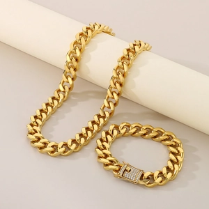 Detailed view of gold Cuban link chain set with CNC diamond-set buckle clasp