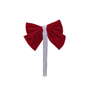 Elegant red velvet bow hair clip featuring long sparkling silver rhinestone tassels