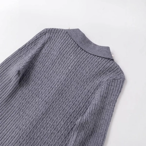 Women's grey cable-knit cardigan featuring a spread collar with elegant pearl accents
