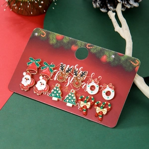 Detailed set of 6 festive Christmas stud earrings featuring Santa, bells, and trees