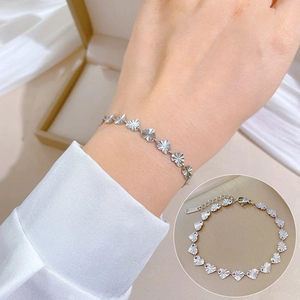 Titanium steel heart chain bracelet for women featuring laser-engraved radial patterns