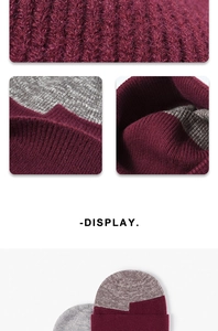 Macro detail of thick rib-knit texture and two-tone stitching on the winter beanie