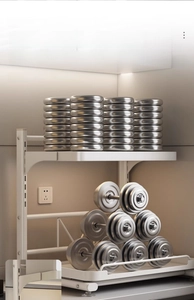 Strong load-bearing white metal pull-out kitchen rack showing extreme weight capacity